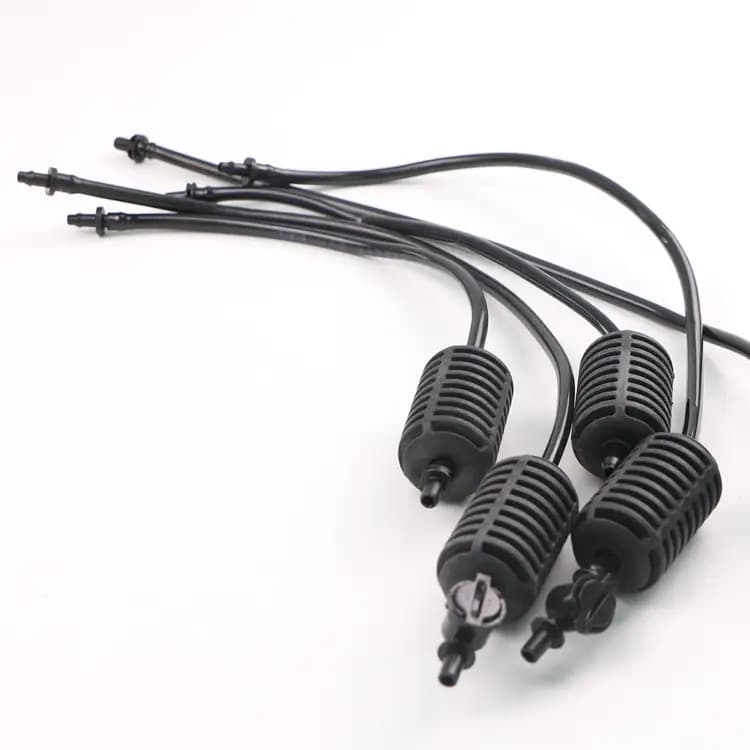 Black hanging tubes and ribbed stabilizer weights for greenhouse micro sprinklers