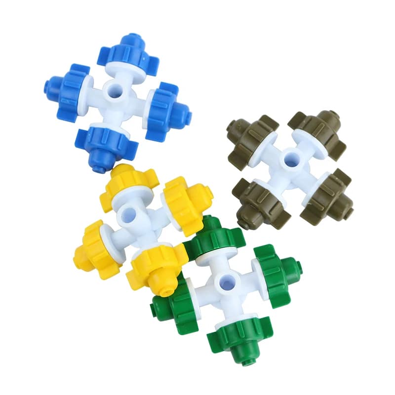 Four-outlet misting nozzles displayed in four colors