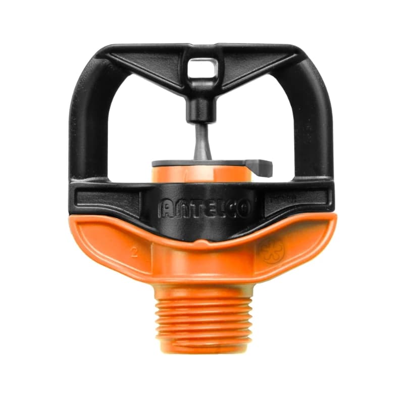 Pressure-compensating mini sprinkler with deflector