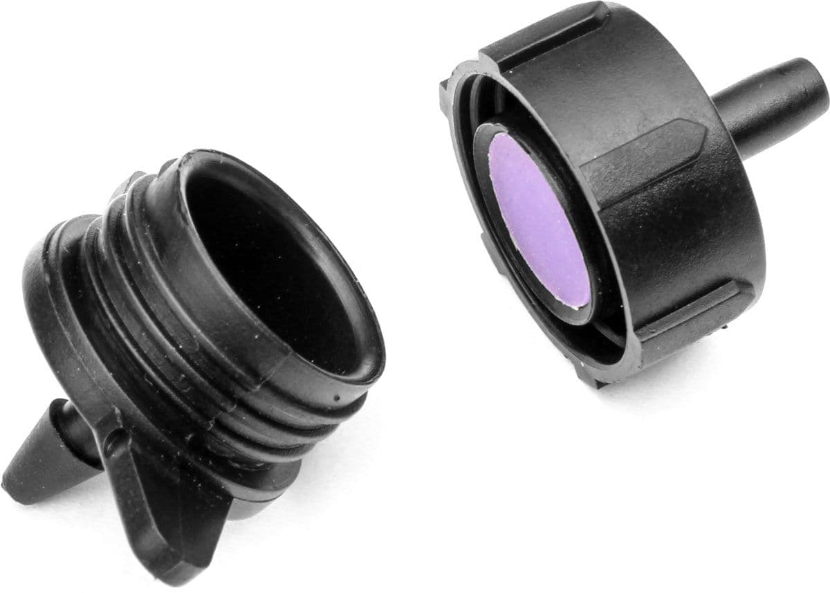 Black pressure-compensating drip emitter showing its removable cap